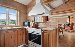 Fridge, stovetop, dishwasher, coffee/tea maker