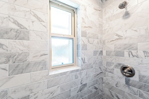 Shower, hair dryer, towels, soap