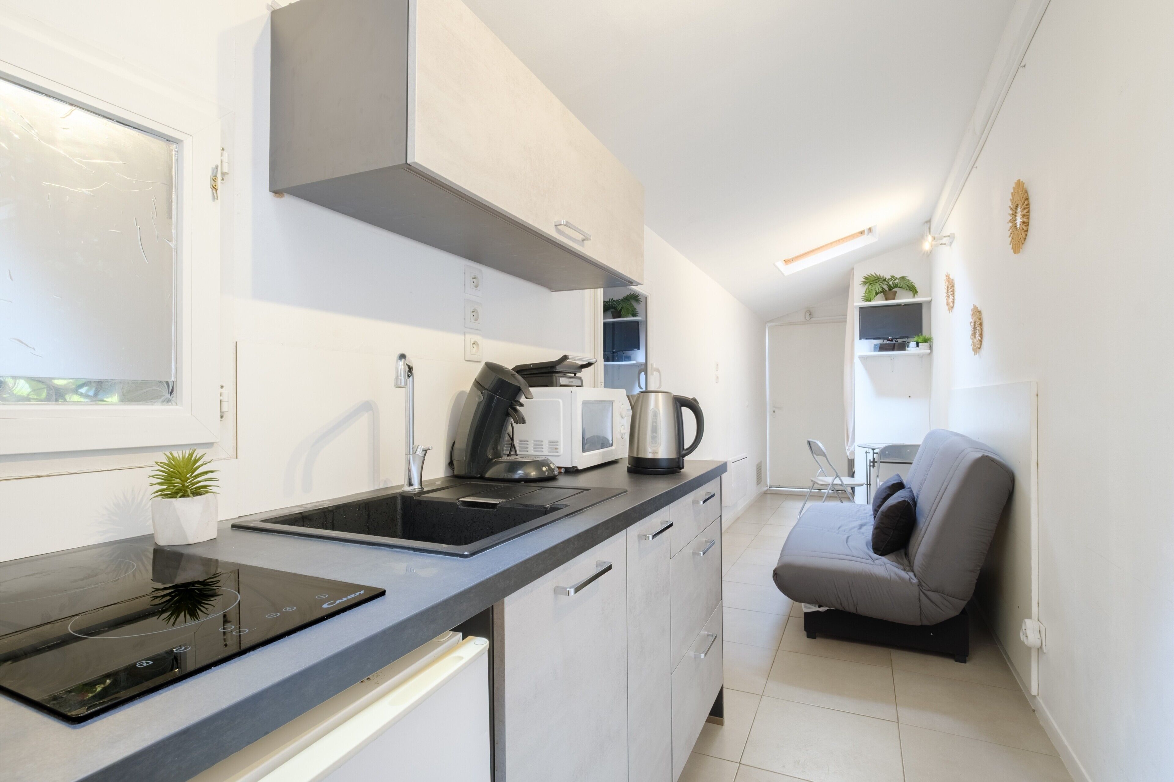 Microwave, stovetop, coffee/tea maker, electric kettle