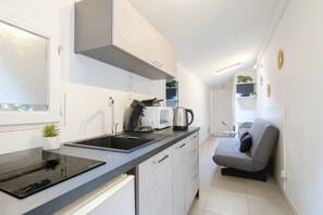 Microwave, stovetop, coffee/tea maker, electric kettle