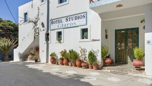 A building with a sign reading 'Hotel Studios Glaros.' - Apartment 'No 2' with Sea View, Wi-Fi and Air Conditioning (Karpathos)