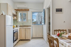 Fridge, stovetop, coffee/tea maker, electric kettle - Apartment 'No 1' with Sea View, Wi-Fi and Air Conditioning (Karpathos)