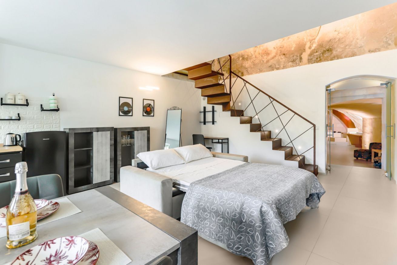 1 slaapkamer, een strijkplank/strijkijzer, wifi, beddengoed