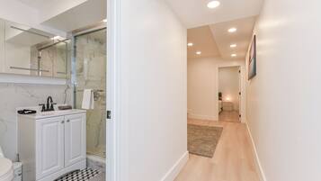 Shower, hair dryer, towels, soap