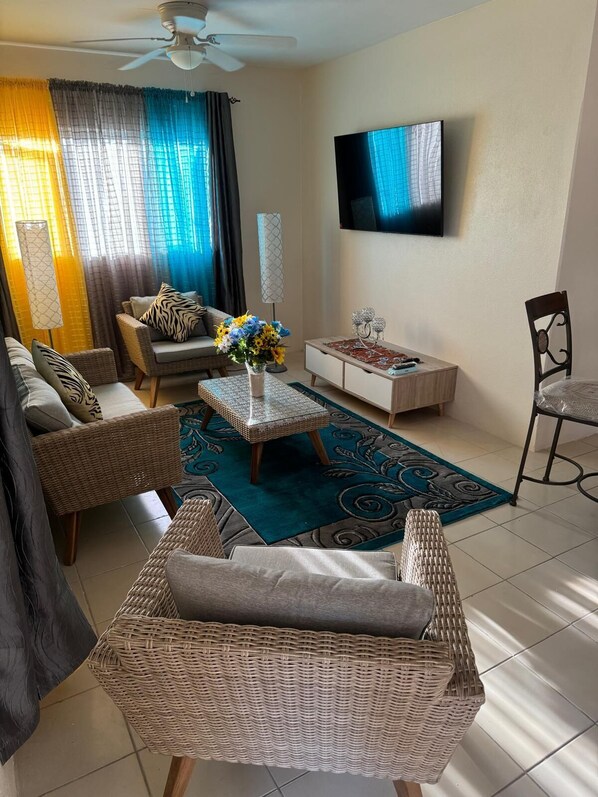 45-inch Smart TV with digital channels, Netflix, streaming services - Queen Anne's Apartments (Nassau)