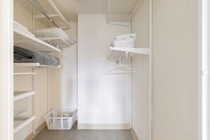 Ample storage and organization in this well-planned walk-in closet.