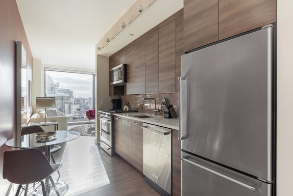 Fridge, microwave, oven, stovetop - Modern One Bedroom with Views (Boston)