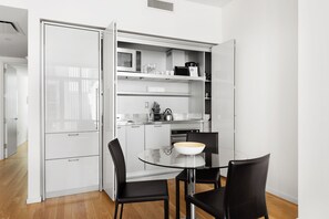 Fridge, microwave, stovetop, coffee/tea maker