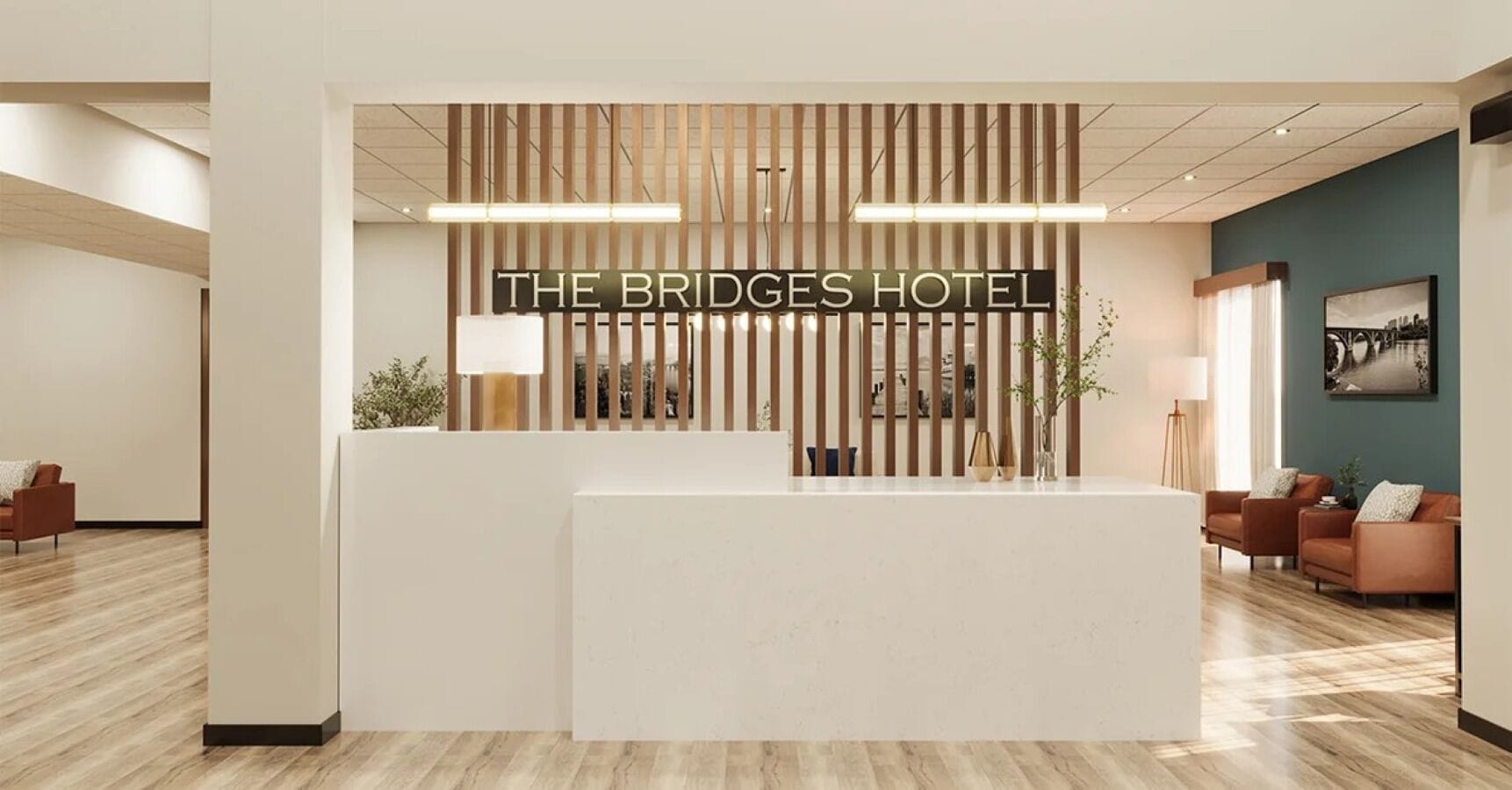 A reception area with a modern design, featuring a reception desk, wooden slats, and a sign that reads "THE BRIDGES HOTEL".