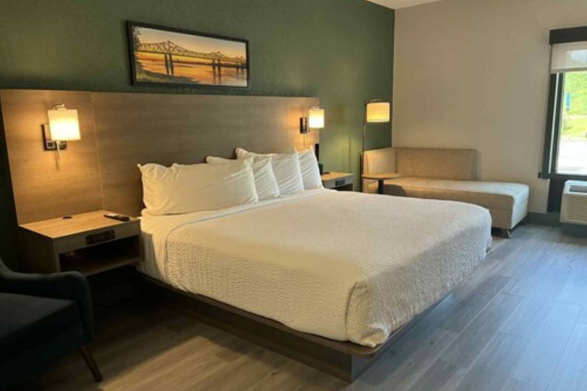 Suite, 1 King Bed with Sofa bed, Non Smoking | Blackout drapes, soundproofing, iron/ironing board, WiFi (free)