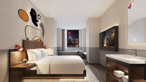 A modern hotel room with a large bed, a bathroom with a large mirror, and a city view through the window. - Mcsrh Hotel -Chengdu Jianshelu (Chengdu)
