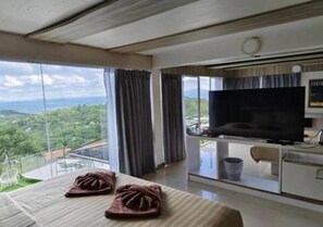Habitación doble exclusiva, balcón, vista a la montaña | Área de sala de estar