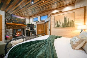 1 bedroom, desk, iron/ironing board, travel crib