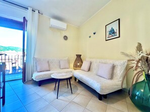 Living area - " Budgent Apartments " (Bari Sardo)