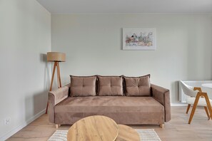 Apartamento conforto, sacada, vista para o mar | 1 quarto, ferros/tábuas de passar roupa, Wi-Fi de cortesia
