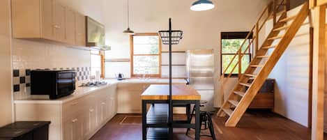 Fridge, microwave, stovetop, cookware/dishes/utensils