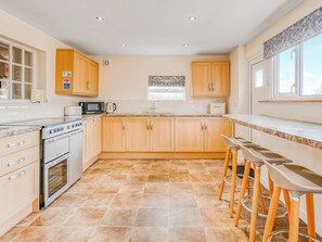 Astianpesukone, syöttötuoli