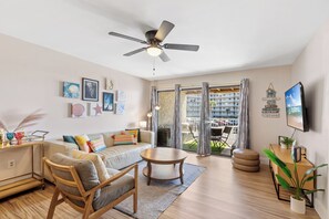 Signature Condo, 2 Bedrooms, Balcony, Courtyard View | Living room | 55-inch Smart TV with cable channels - Seaside Beach & Racquet Club 2207 (Orange Beach)