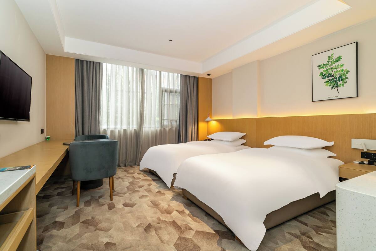 Desk, laptop workspace, free WiFi, bed sheets