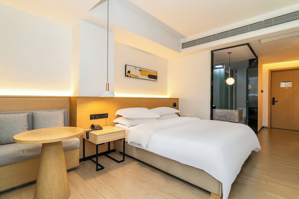 Desk, laptop workspace, free WiFi, bed sheets