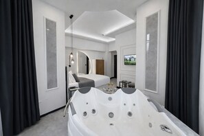 Honeymoon Double Room, Hot Tub | Bathroom | Free toiletries, hair dryer, towels, soap