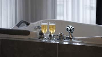 Honeymoon Double Room, Hot Tub | Bathroom | Free toiletries, hair dryer, towels, soap