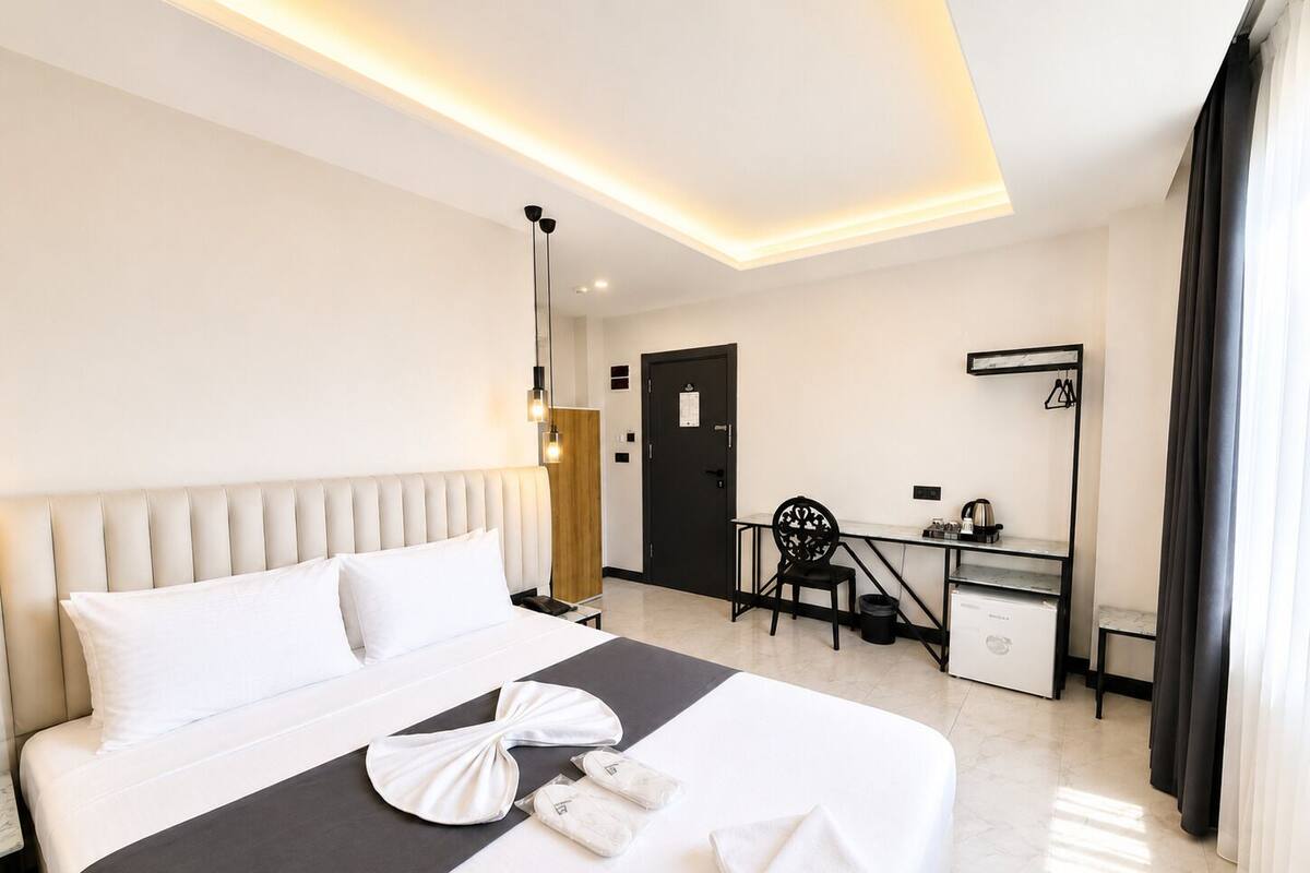 Habitación Deluxe doble | Minibar, escritorio, espacio para trabajar con un portátil y wifi gratis