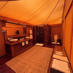 Tented Suite | Bathroom | Shower, free toiletries, bathrobes, slippers