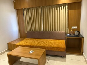 Deluxe Double Room, 1 King Bed, Private Bathroom, City View | Living area | TV - Hotel Vikramaditya (Ujjain)