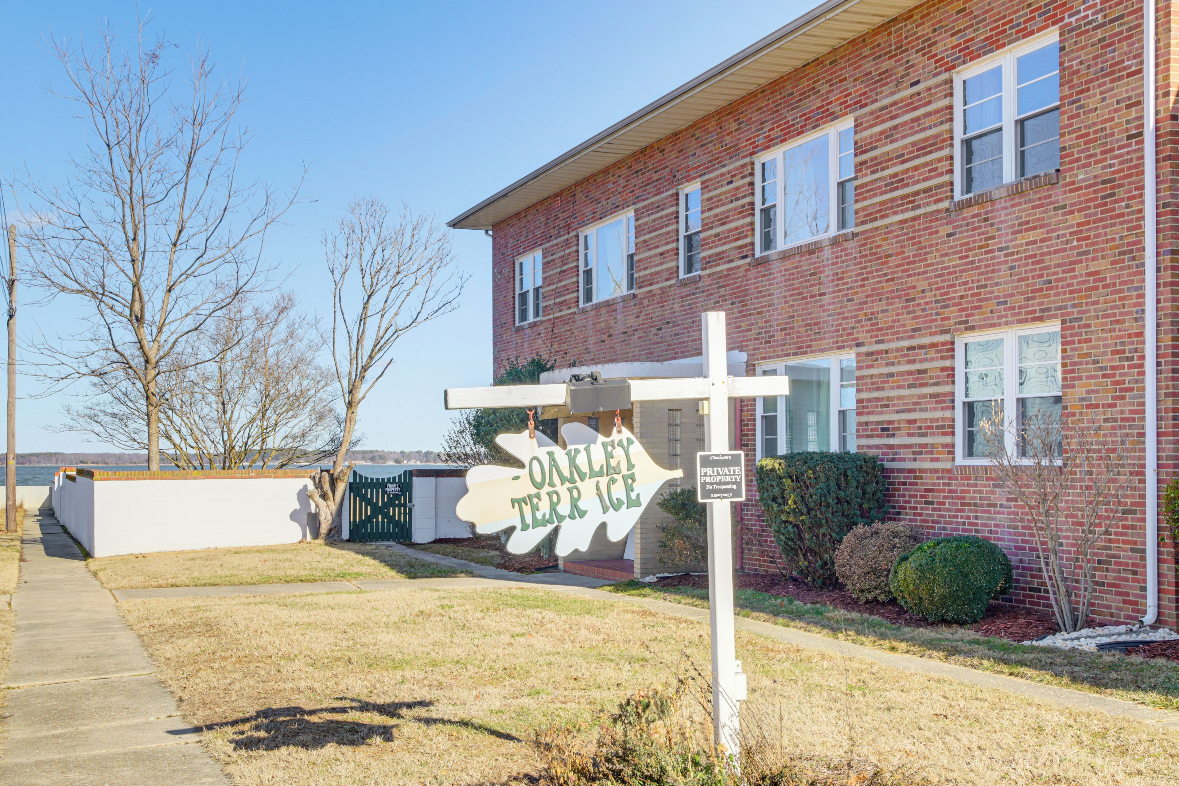 A brick building with a sign reading "Oakley Terr Ice."