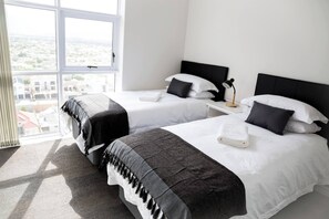 3 habitaciones, tabla de planchar con plancha y acceso a internet
