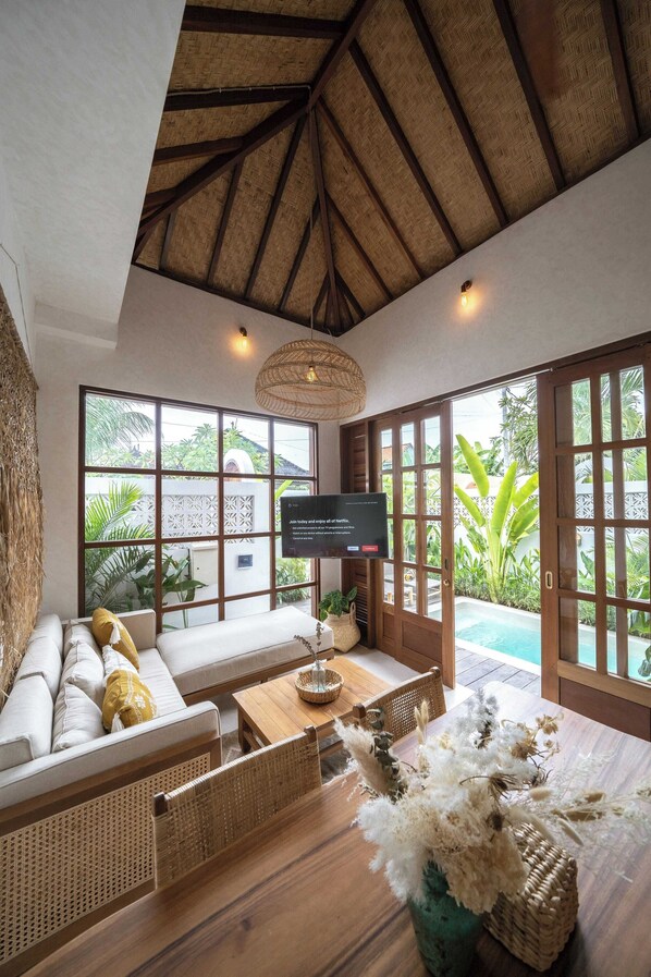 Villa Standard, 1 chambre, patio, vue piscine | Coin séjour