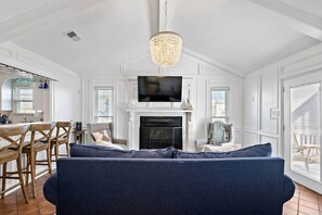 Smart TV, fireplace, books
