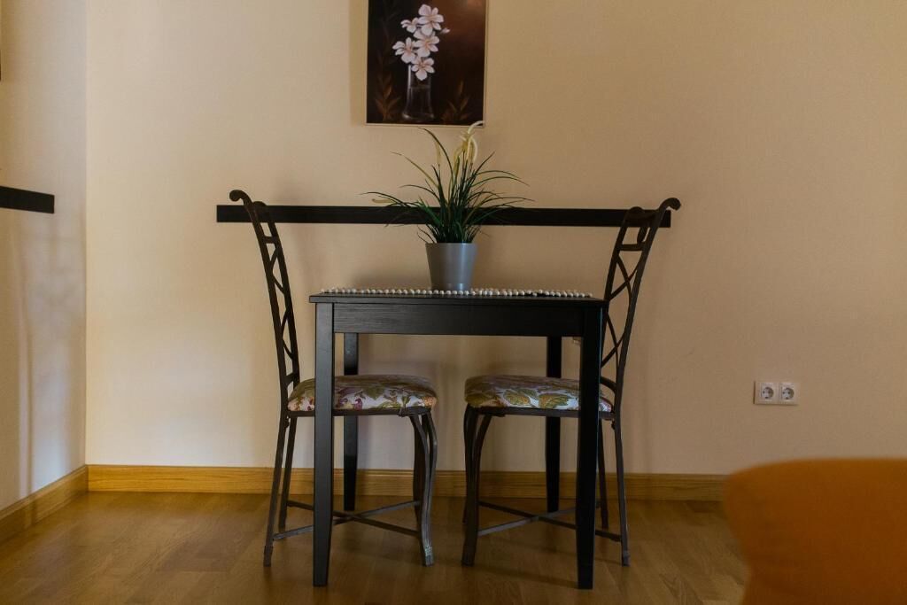 Superior penthouse | Woonruimte | Een 22-inch televisie met kabelzenders