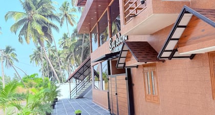 Sea island resort near Pulimut beach with AC and balcony.