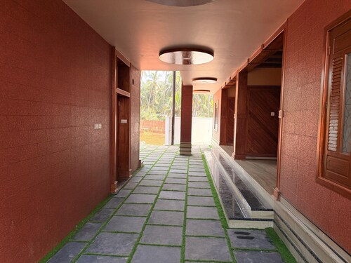 Sea island resort near Pulimut beach with AC and balcony.