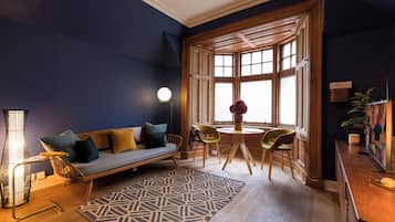 Standard Cottage | Living area | 25-inch LED TV with cable channels