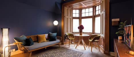 Standard Cottage | Living area | 25-inch LED TV with cable channels