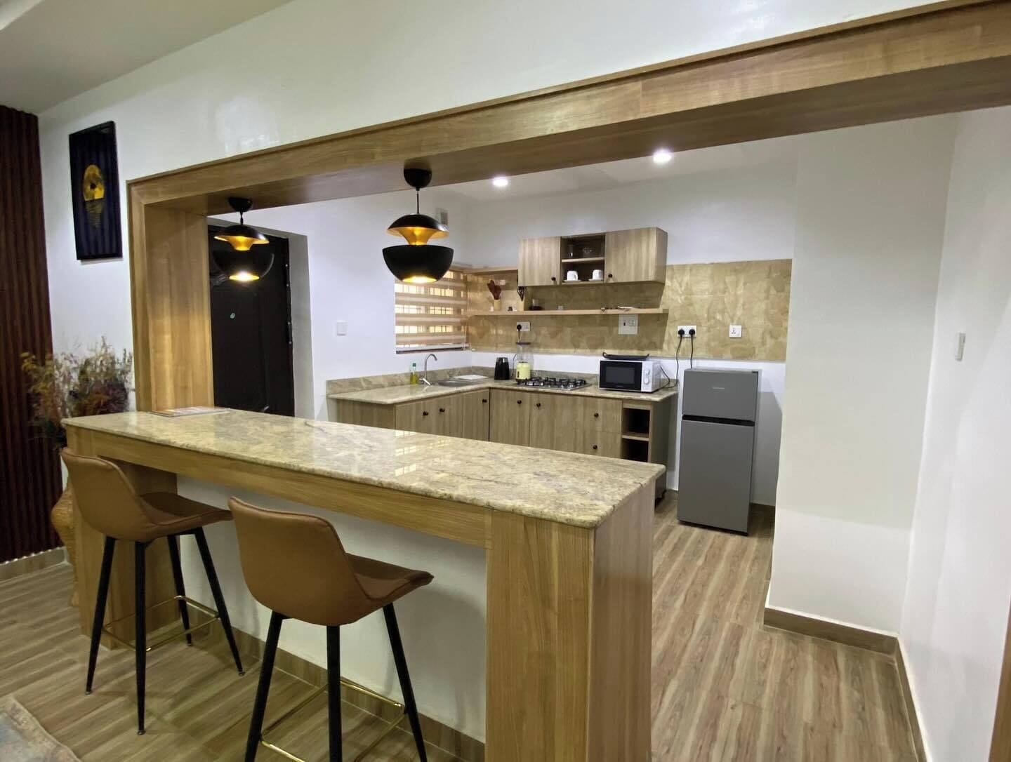 Family Apartment, Balcony, City View | Private kitchen | Fridge, microwave, oven, stovetop