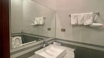 Shower, free toiletries, hair dryer, towels