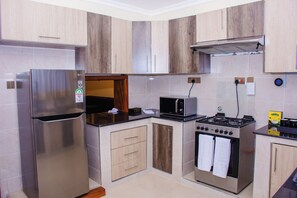 Fridge, microwave, oven, stovetop - Epitome of Luxury Living: Fully Furnished 1, 2 & 3-Bedroom Apartment, Kitengela (Kitengela)