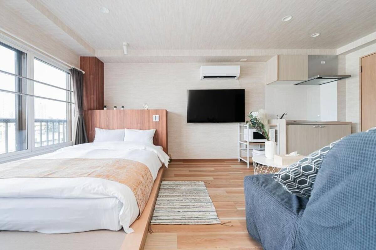 Elite Apartment, City View | Peralatan tempat tidur premium, gebar bulu kapas, meja, kalis bunyi 