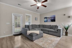 TV, offices - Modern Townhome in Pooler | Pool & Trails (Pooler)