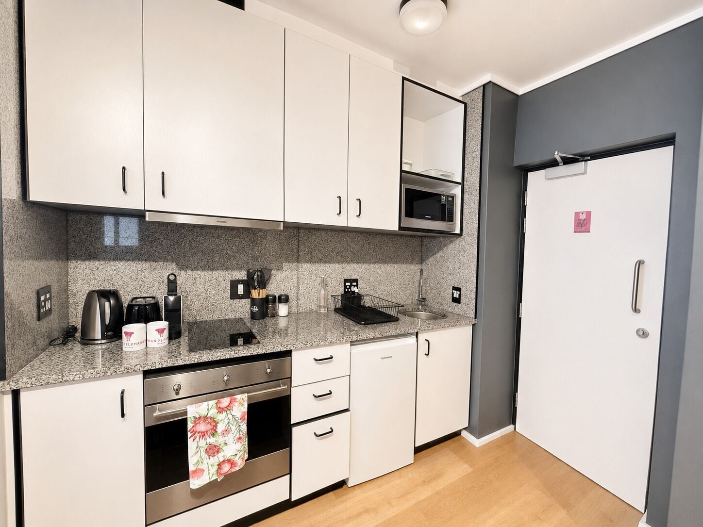Apartment 209 | Private kitchen | Espresso maker, mini-fridge, microwave, oven