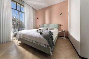 2 bedrooms, blackout curtains, iron/ironing board, free WiFi