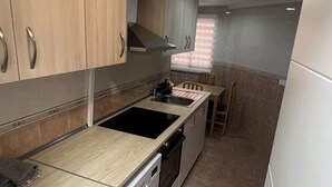Apartment | Private kitchen | Fridge, microwave, oven, stovetop - Bergamo Bliss Apartment - City Center Gem (Bergamo)