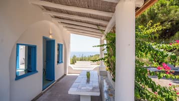 Deluxe kamer, uitzicht op zee | Terras