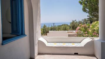 Deluxe kamer, uitzicht op zee | Terras