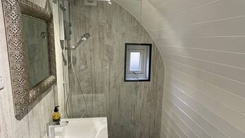 Shower, hair dryer, towels, toilet paper