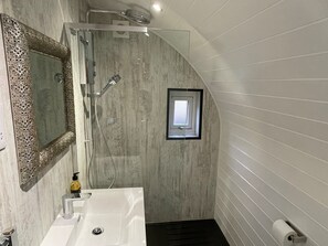 Shower, hair dryer, towels, toilet paper